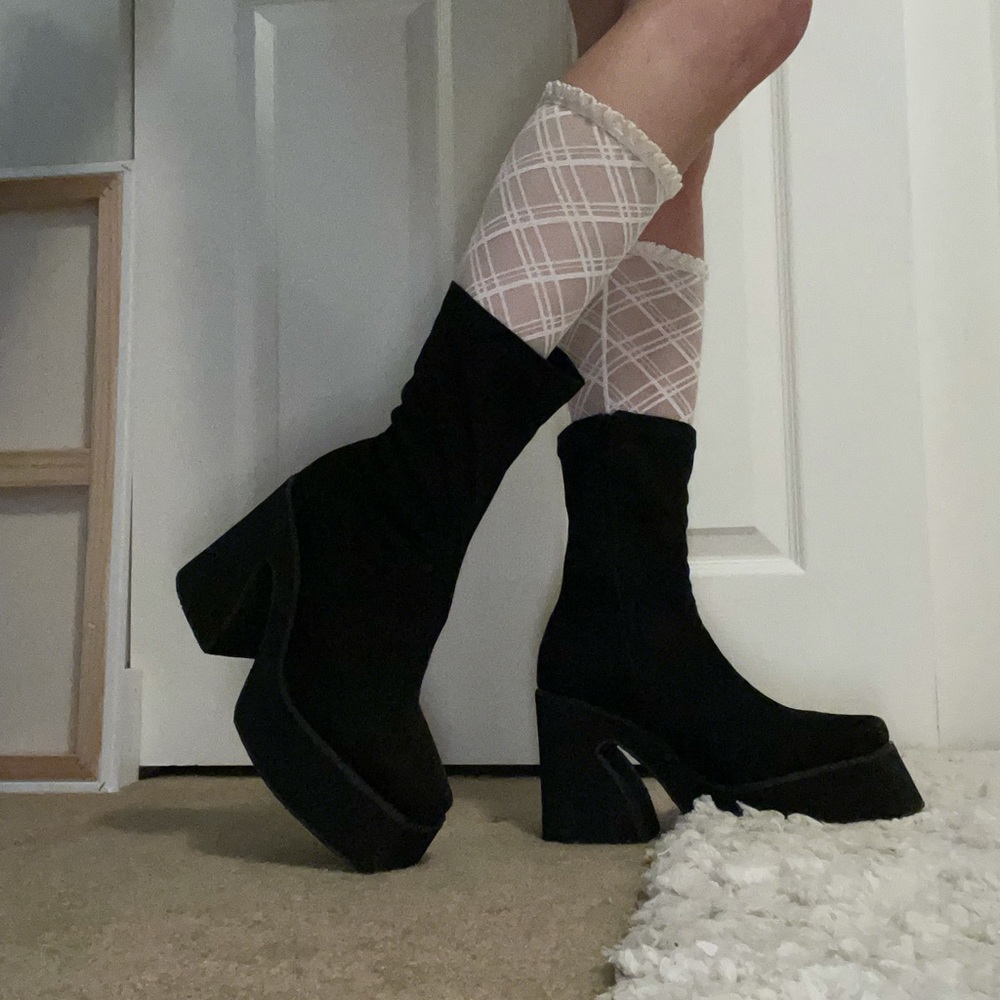 Black funky heeled suede boots